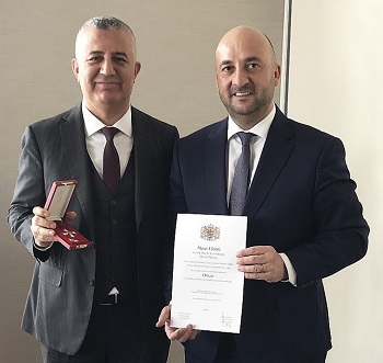 The chairman and CEO of MARS, Garip Sahillioglu (on the left), received medal and diploma of the merit from the Deputy prime minister and Minister of the Economy, Mr. Etienne Schneider (on the right).<br />
